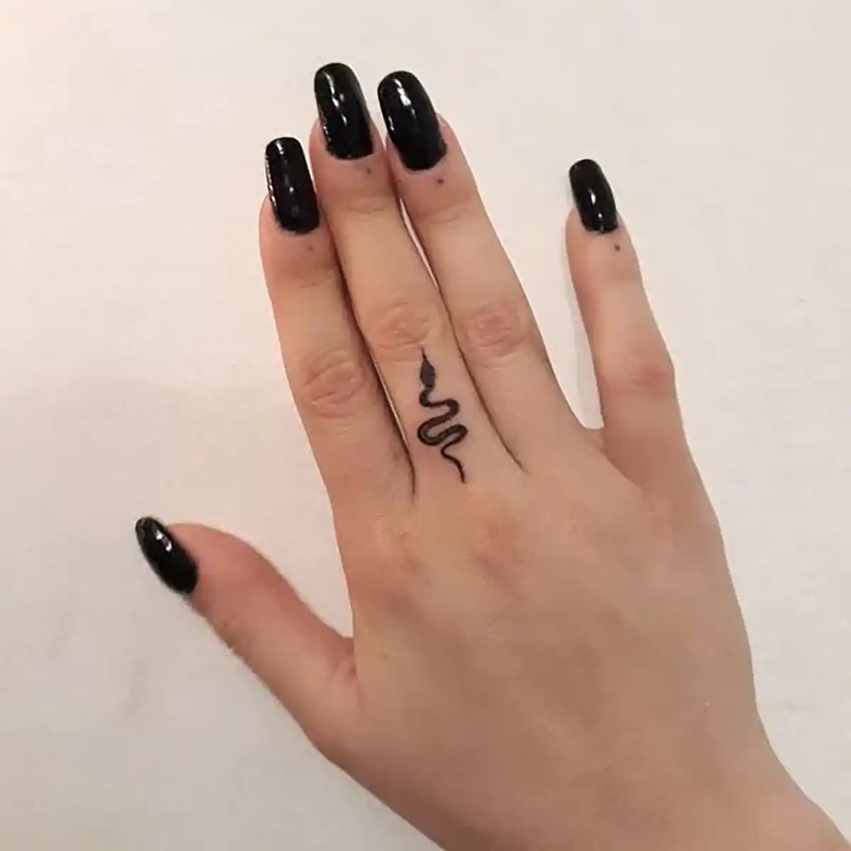 تاتو روی دست مردانه